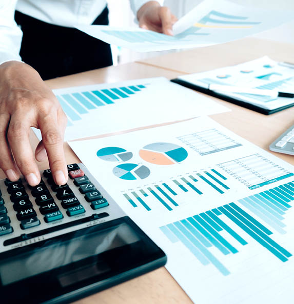 Finances Saving Economy concept. Female accountant or banker use calculator.